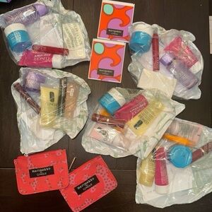 5 brand new Clinique makeup and skincare products with matching cosmetic bags!